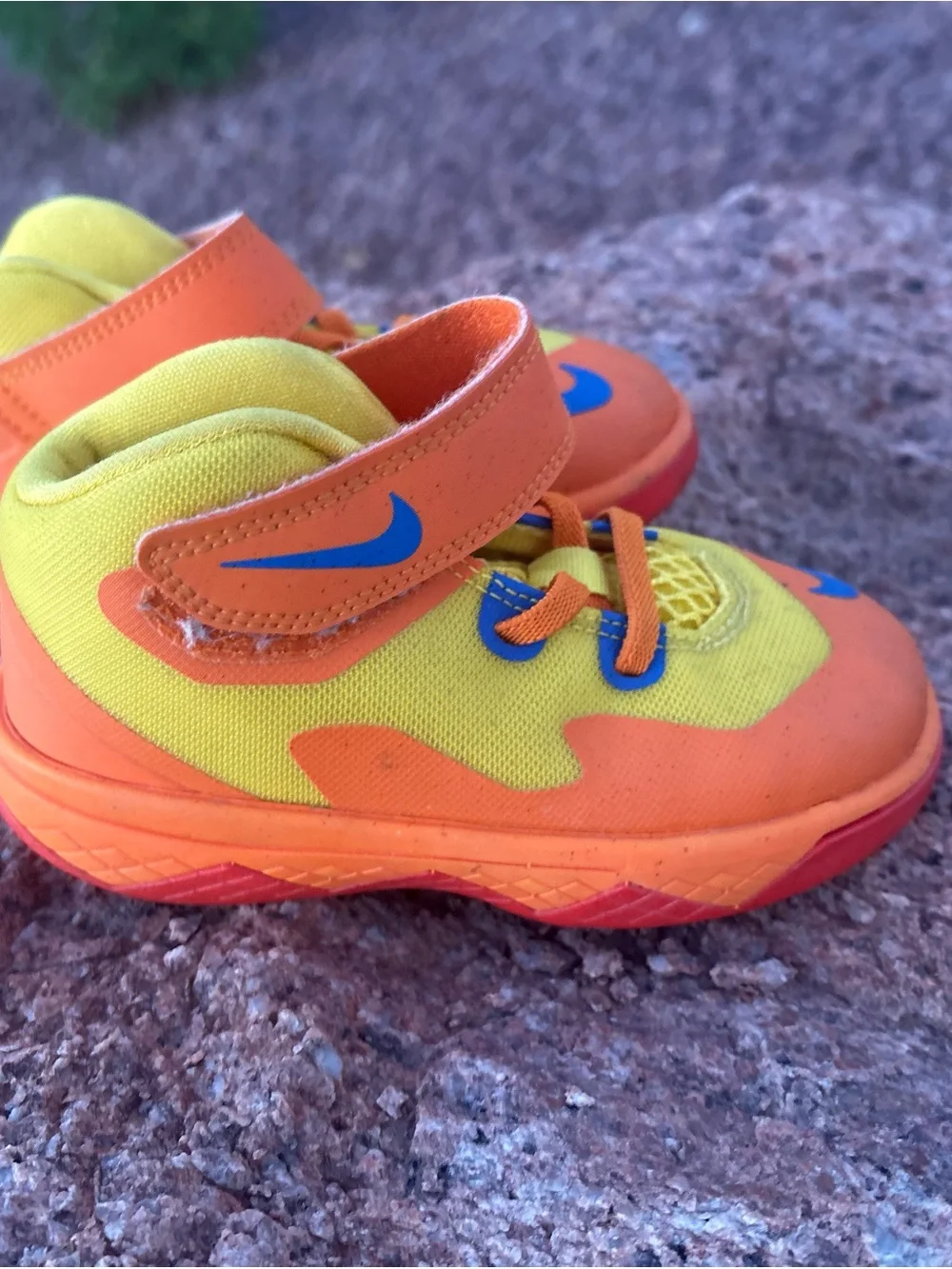Nike Kids Orange and Yellow Hook-and-Loop Sneakers with Blue Swoosh